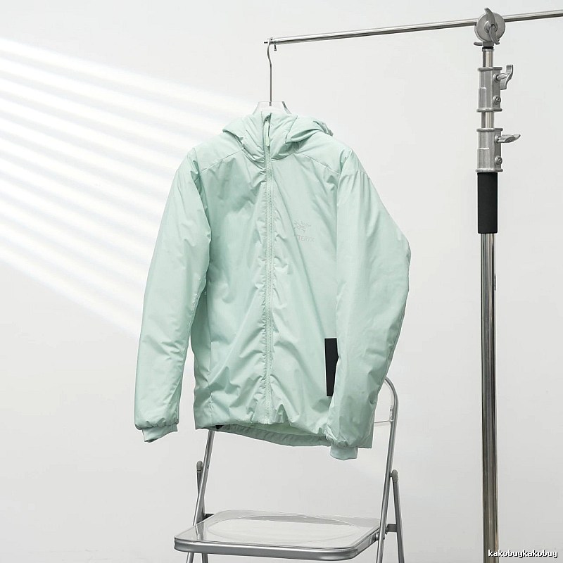Clean Hooded Profile And Minimal Chest Branding Arc'teryx Lightweight Shell Jacket in Mint Green
